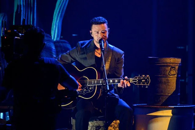 <p>Michael Buckner/Billboard via Getty</p> Justin Timberlake performs on the iHeartRadioMusic Awards in Los Angeles on April 1, 2024