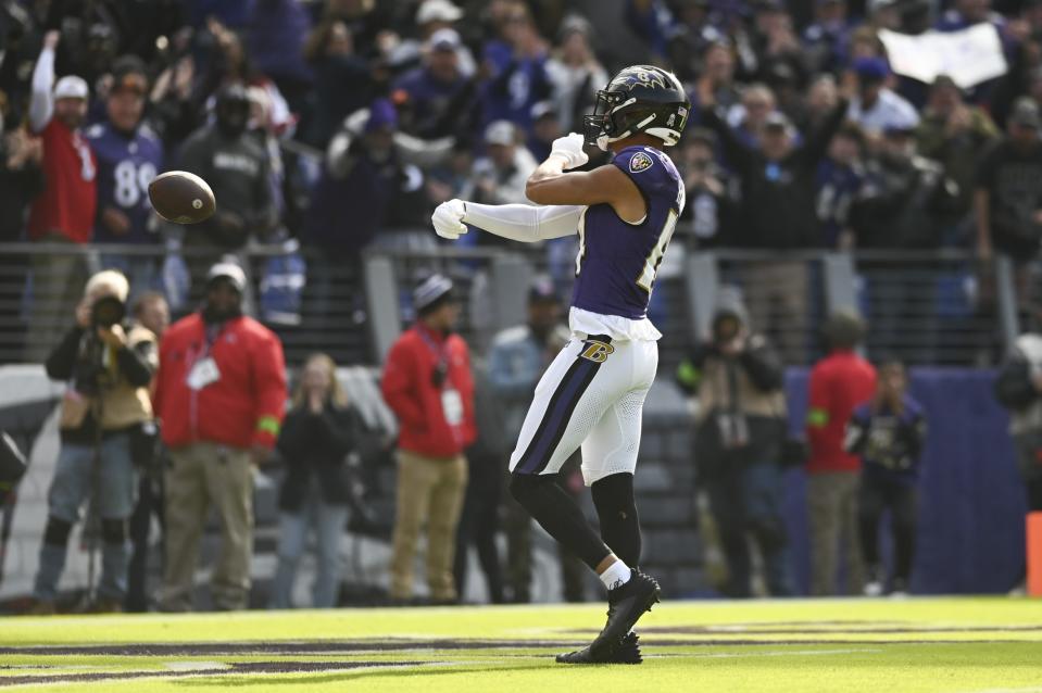 Nov 12, 2023; Baltimore, Maryland, USA; Baltimore Ravens safety <a class="link " href="https://sports.yahoo.com/nfl/players/33969" data-i13n="sec:content-canvas;subsec:anchor_text;elm:context_link" data-ylk="slk:Kyle Hamilton;sec:content-canvas;subsec:anchor_text;elm:context_link;itc:0">Kyle Hamilton</a> (14) celebrates after returning a interception for a first quarter touchdown against the Cleveland Browns at M&T Bank Stadium. Mandatory Credit: Tommy Gilligan-USA TODAY Sports