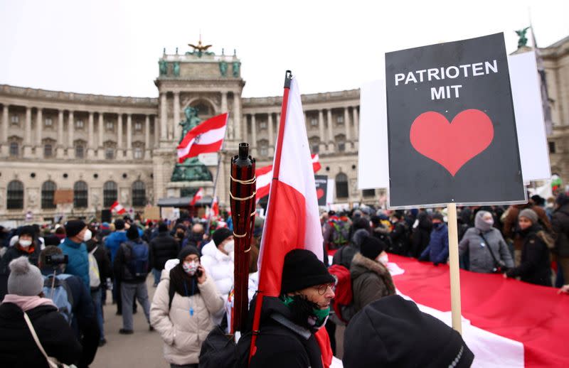 Thousands of people march to protest against restrictions on public life to curb the coronavirus pandemic