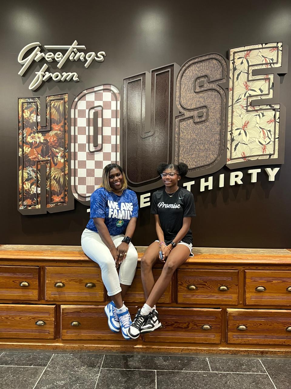 Miniya Mitchell and her mother, Daquita Cummings, at House Three Thirty in Akron.