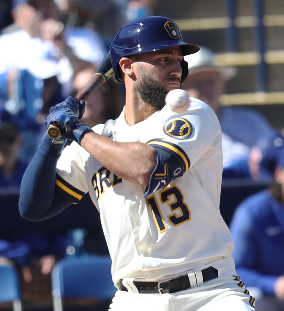 Abraham Toro stays away from a high pitch during their game against the Los Angeles Dodgers in spring training.