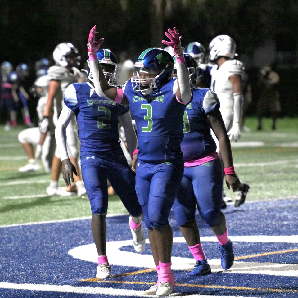 Somerset’s Tristian Johnson celebrates scoring a touchdown during a regular season game against American Heritage on Oct. 13, 2023.