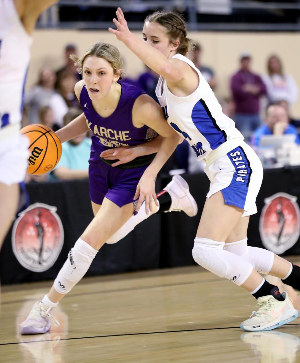 OkarcheÕs Jadyn Rother tries to get past Hadley Gibson as the Okarche Lady Warriors play the Cyril Lady Pirates during the Class A Girls State Basketball Championship Tournament at State Fair Arena on March 1, 2023 in Oklahoma City, Okla. 