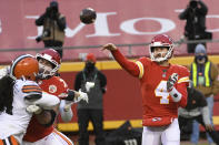 Kansas City Chiefs quarterback Chad Henne throws a pass during the second half of an NFL divisional round football game against the Cleveland Browns, Sunday, Jan. 17, 2021, in Kansas City. The Chiefs won 22-17. (AP Photo/Reed Hoffmann)