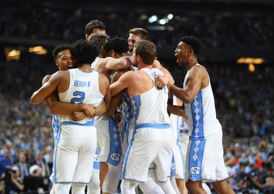 <p>North Carolina Tar Heels players celebrate after defeating the Gonzaga Bulldogs in the championship game of the 2017 NCAA Men’s Final Four at University of Phoenix Stadium. Mandatory Credit: Bob Donnan-USA TODAY Sports </p>