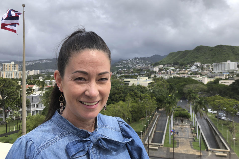 Nani Medeiros, chief housing officer for Hawaii Gov. Josh Green, poses for a photo at the state Capitol in Honolulu, on Feb. 24, 2023. Hawaii's housing shortage has set off a population decline and grown so acute it has sparked widespread concern many of Hawaii's children won't be able to afford living in their homeland as adults. (AP Photo/Audrey McAvoy)