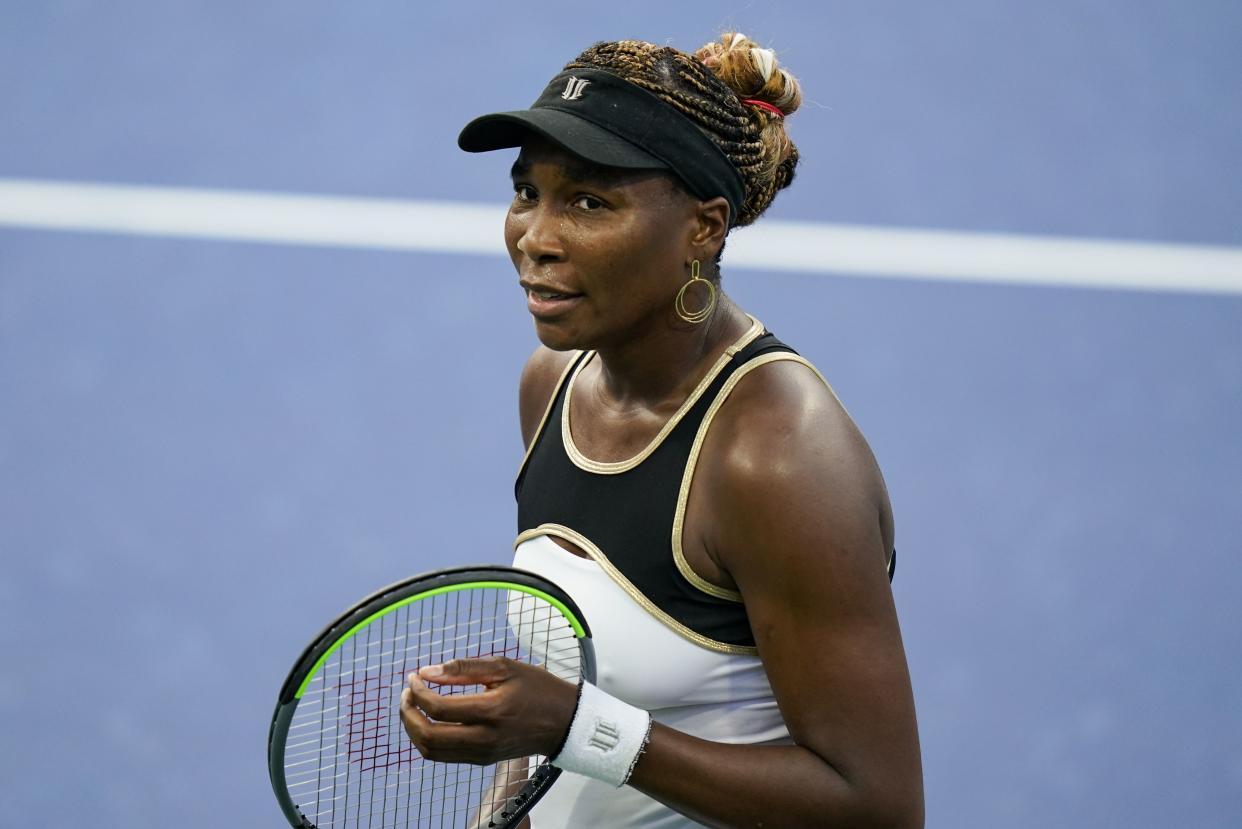 In this file photo, Venus Williams, of the United States, reacts during a match at the Western & Southern Open tennis tournament, on Aug. 22, 2020, in New York.