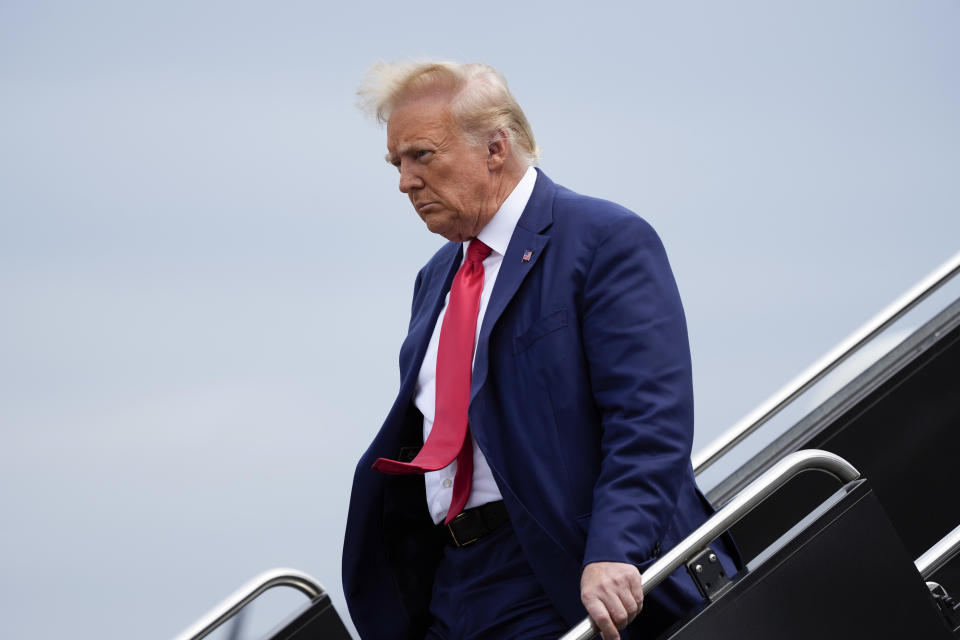 FILE - Former President Donald Trump arrives at Ronald Reagan Washington National Airport, Thursday, Aug. 3, 2023, in Arlington, Va., as he heads to Washington to face a judge on federal conspiracy charges alleging Trump conspired to subvert the 2020 election. The Associated Press reported on stories circulating online incorrectly claiming Trump is facing the death penalty on federal charges filed against him in Washington, D.C., on Tuesday related to his efforts to overturn the results of the 2020 election. (AP Photo/Alex Brandon)