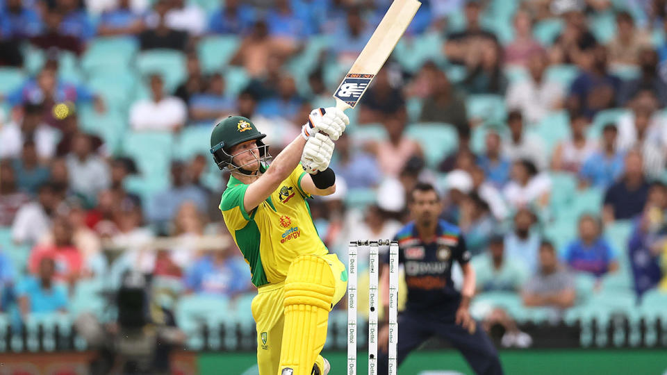 Seen here, Steve Smith smashes a ball towards the boundary against India.