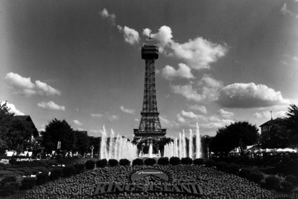 Paramount's Kings Island's landmark Eiffel Tower, a replica of the original in France, stands tall above International Street featuring European-style buildings surrounding the majestic Royal Fountain in this undated file photo.