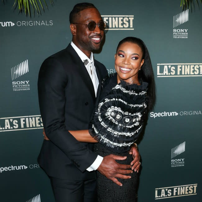 Gabrielle Union con su esposo Dwyane Wade credit:Bang Showbiz