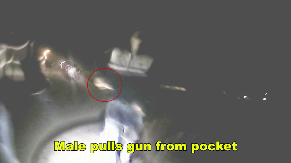 A screenshot of body camera footage released by Farmington police shows a man police identified as Elias Buck pulling a handgun on Officer Joseph Barreto on Jan. 7. Buck is accused of shooting Barreto once in the right arm as the officer tried to detain Buck.