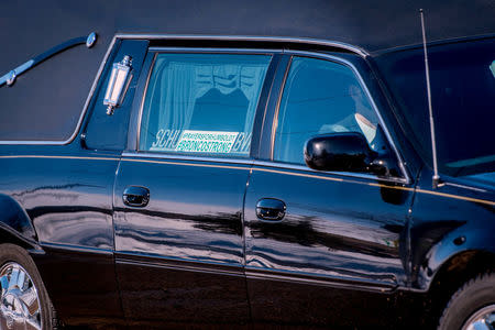 A #BRONCOSTRONG sign is displayed in the hearse as the procession departs after funeral services for radio broadcaster Tyler Bieber, one of the people killed in the crash of a bus carrying the Humboldt Broncos Junior A hockey team, in Humboldt, Saskatchewan, Canada April 12, 2018. REUTERS/Matt Smith