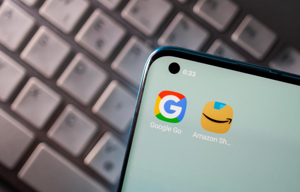 Smartphone with Google and Amazon apps are seen placed on keyboard in this illustration picture taken on June 25, 2021. REUTERS/Dado Ruvic/Illustration