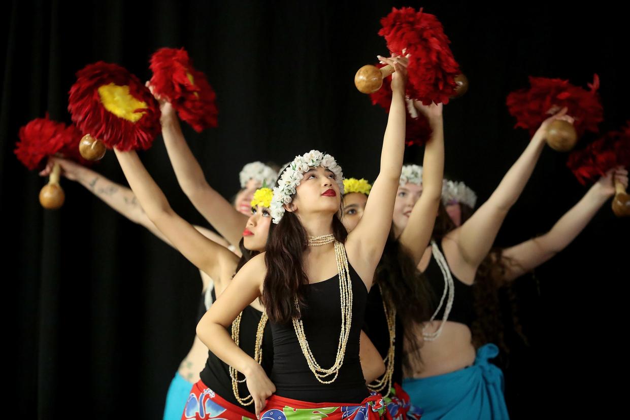 Sunshine From Polynesia dancers perform during the Voices of Pacific Island Nations Together for Education Fundraiser and Luau at the Clearwater Casino in Suquamish on Aug. 12. The organization, also known as VOPIN, is raising money to continue building its programs that focus on tutoring in Kitsap schools and arts and cultural activities.