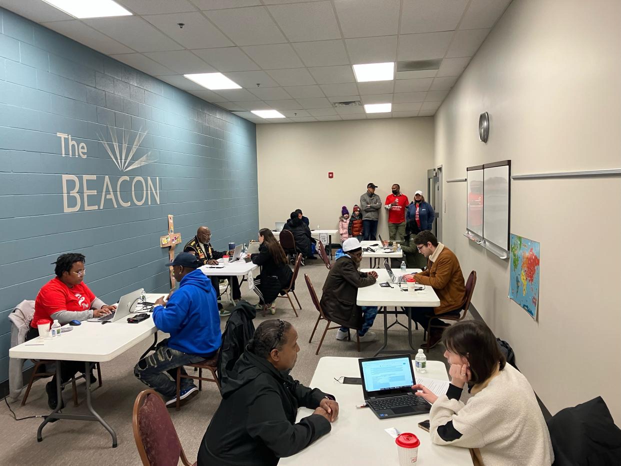 Volunteers from the University of Notre Dame Law School record information from community members seeking to have their criminal records expunged at an event at the Beacon Resource Center in South Bend on Saturday April 1, 2023.