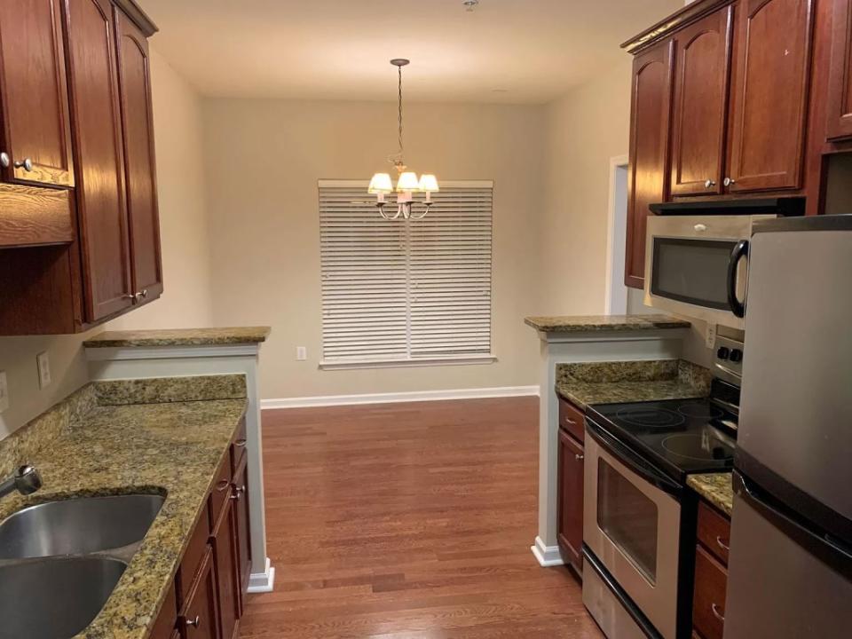 The modest kitchen and dining space. Dogwood Court Rentals