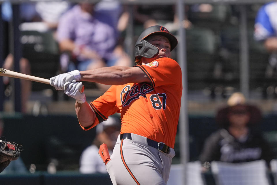 Baltimore Orioles Jackson Holliday (87) swings at a pitch in the first inning of a spring training baseball game against the Atlanta Braves in North Port, Fla., Monday, Feb. 26, 2024. (AP Photo/Gerald Herbert)