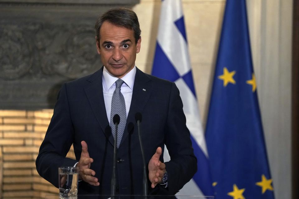 Greece's Prime Minister Kyriakos Mitsotakis makes statements with his Slovak counterpart Eduard Heger during a news conference at Maximos Mansion in Athens, Thursday, Sept. 30, 2021 (AP Photo/Thanassis Stavrakis)