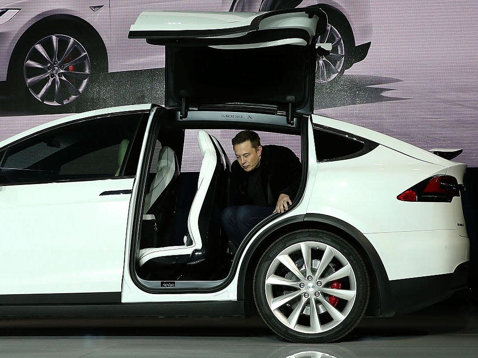 Tesla CEO Elon Musk steps out of the new Tesla Model X