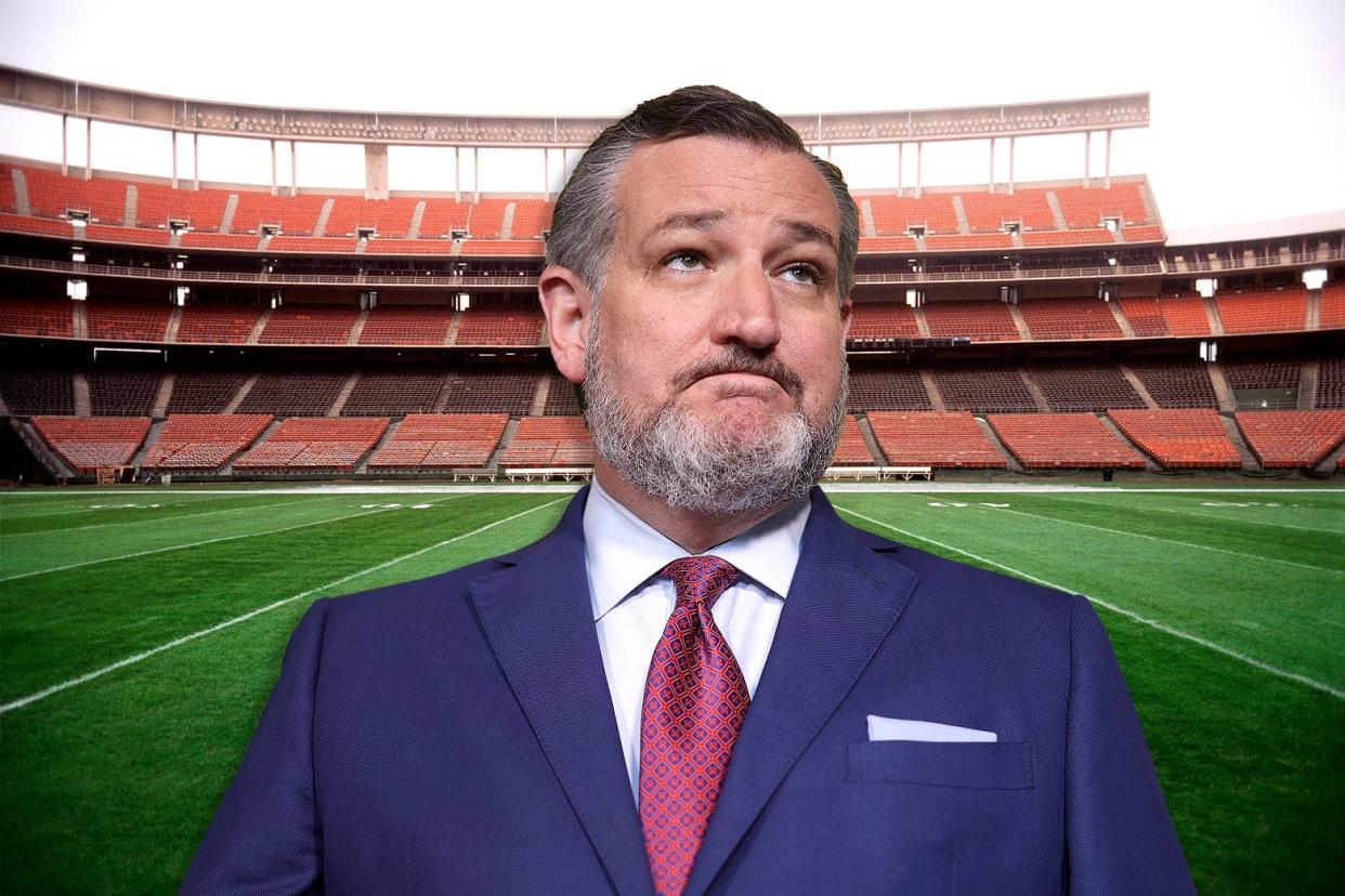 Ted Cruz frowning and looking upward, photoshopped in front of an empty football stadium.