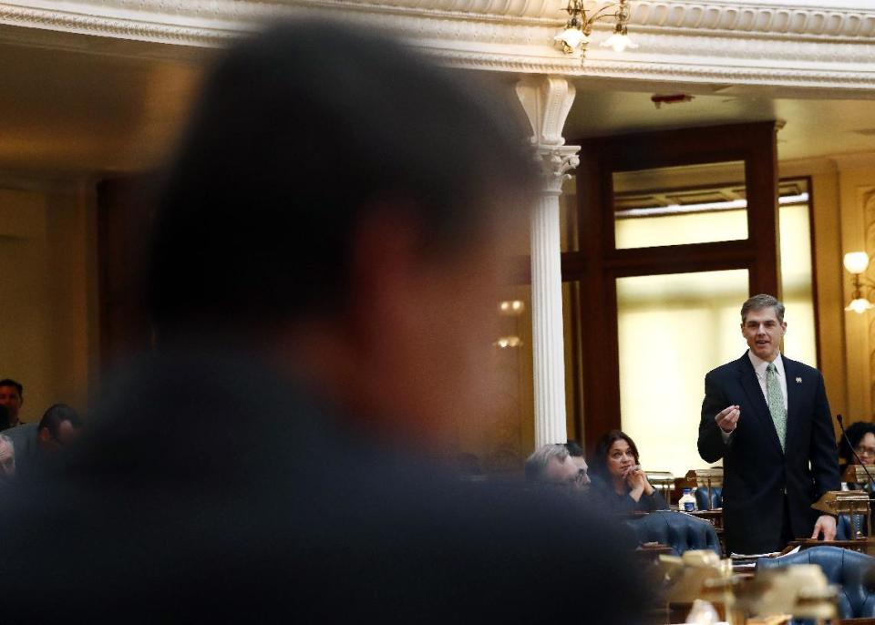 New Jersey assemblyman Jay Webber, R-Parsippany, right, speaks against a bill requiring presidential candidates to disclose tax returns in order to appear on ballots in the state as assemblyman John McKeon, D-Madison, left, the bill's sponsor, listens during a meeting in the state legislature, Thursday, March 16, 2017, in Trenton, N.J. The measure, which was approved by the assembly, requires presidential and vice presidential candidates to release five years of federal tax returns to appear on the ballot. The bill will head to Republican Gov. Chris Christie to sign or veto. (AP Photo/Julio Cortez)