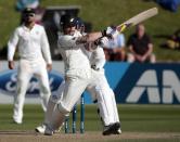 New Zealand's Brendon McCullum plays a shot against India during the second innings on day four of the second international test cricket match at the Basin Reserve in Wellington, February 17, 2014.