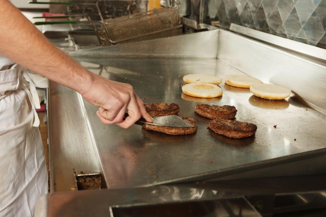 cooking burgers