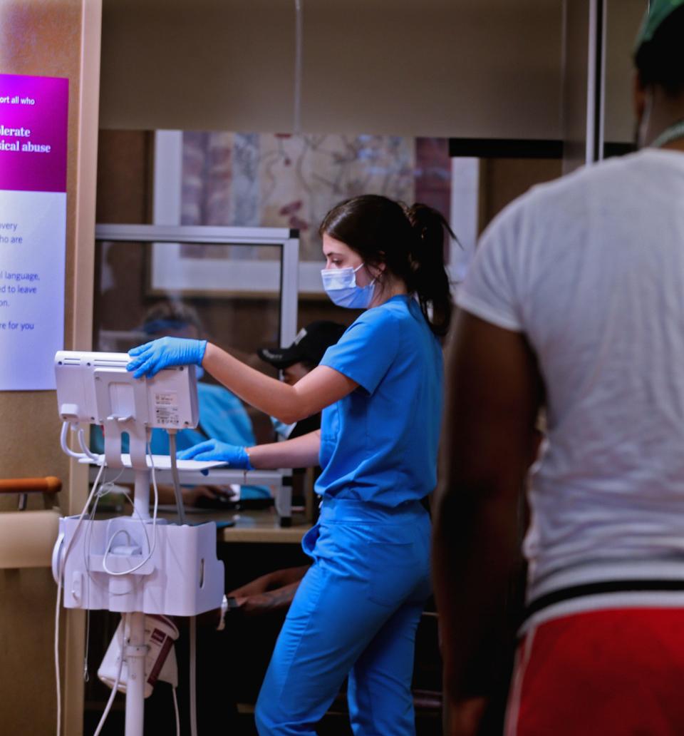 Emergency department nurse intern, Elizabeth Camacho does triage on a patient at Ascension SE Wisconsin Hospital - St. Joseph Campus in Milwaukee.