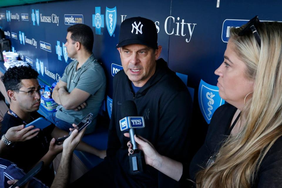 New York Yankees manager Aaron Boone talks with the media before a baseball game against thye Kansas City Royals in Kansas City, Mo., Saturday, Sept. 30, 2023. (AP Photo/Colin E. Braley)