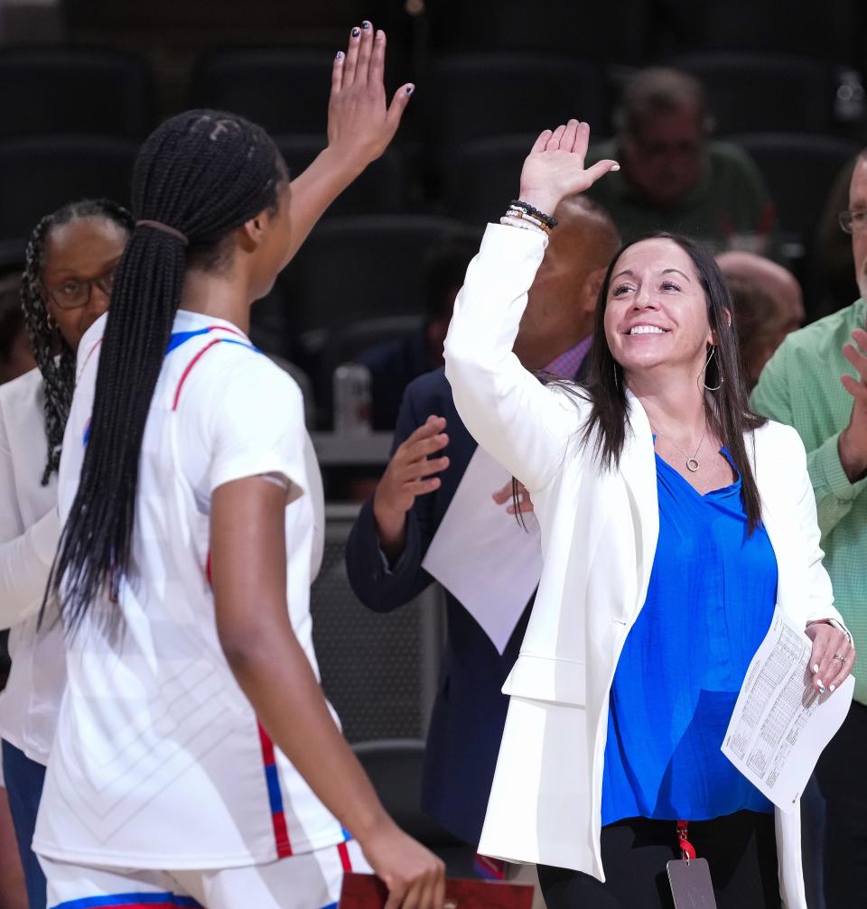 Indiana All-Star head coach Kristi Ulrich high-fives Indiana All-Star Laila Hull (1) on Saturday, June 10, 2023, during the Indiana All-Stars game vs. Kentucky All-Stars at Gainbridge Fieldhouse in Indianapolis. 