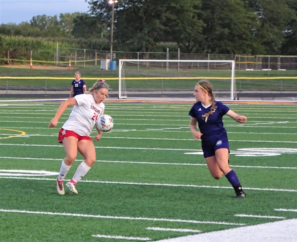 Fairfield Union's Avery Martin and Bloom-Carroll's Savannah Wilde battle for the ball during Saturday night's MSL-Buckeye Division game. Wilde scored both of the Bulldogs' goals in a 2-2 tie.