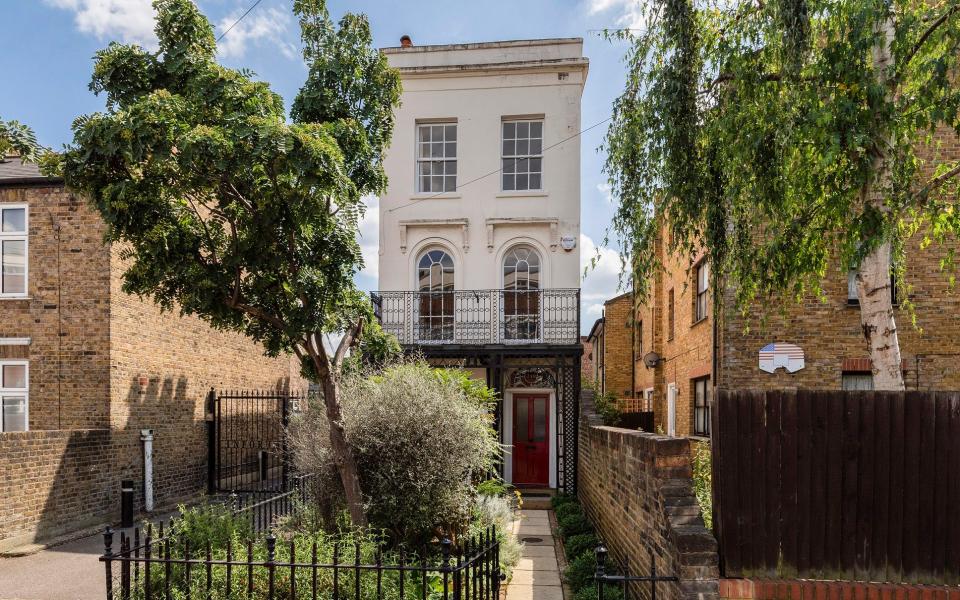 A Grade II listed Georgian house in Peckham, south London, with original features including cornicing, a fan light and a cast- iron balcony. It is £995,000 with Munday’s