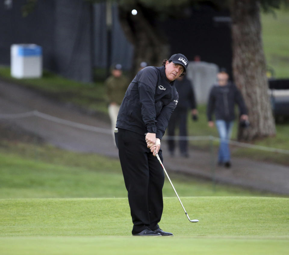 Phil Michelson hits to the second green during the first round of the Genesis Open golf tournament at Riviera Country Club in the Pacific Palisades area of Los Angeles on Thursday, Feb. 14, 2019. (AP Photo/Reed Saxon)