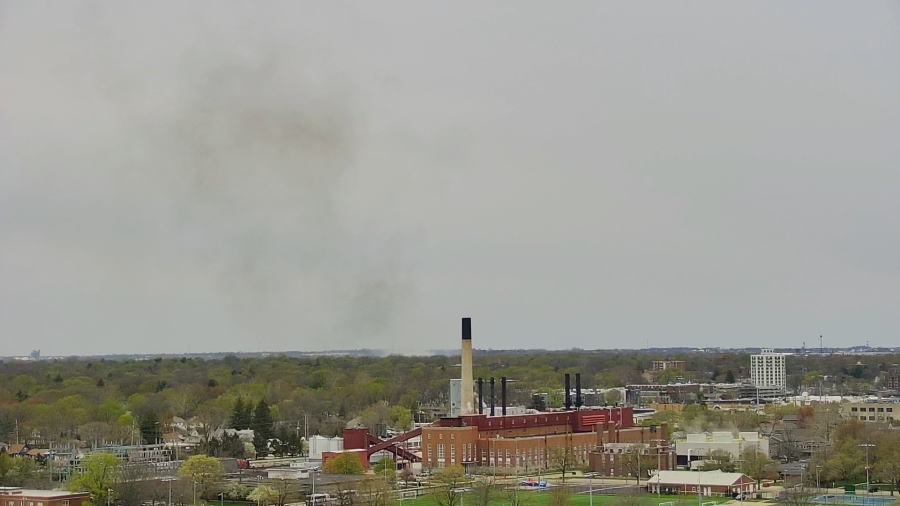 A still image of smoke rising from an April 11 fire in Champaign’s Garden Hills neighborhood, recorded on a skycam at Memorial Stadium