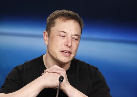 FILE PHOTO: SpaceX founder Elon Musk speaks at a press conference following the first launch of a SpaceX Falcon Heavy rocket at the Kennedy Space Center in Cape Canaveral, Florida, U.S., February 6, 2018. REUTERS/Joe Skipper