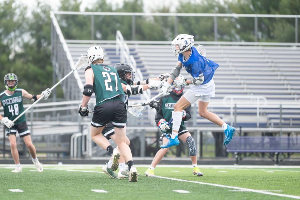 Harper Creek senior Brady Vette jumps to shoot during an All-City tournament game against Pennfield at Lakeview High School on Friday, April 26, 2024.