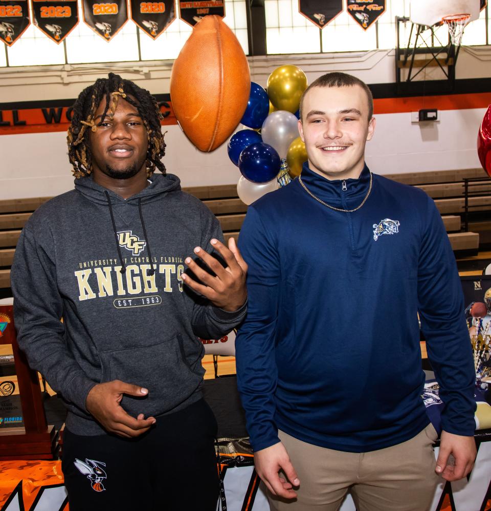 Caleb Rollerson, left, who signed with University of Central Florida and Andrew Zock, right, who signed with United States Naval Academy, toss a football after signing their letters of intent Wednesday afternoon, February 7, 2024. Hawthorne High School celebrated National Signing Day with seven of their football players signing letters of intent with colleges throughout the country. Head Football Coach Cornelius Ingram introduced all seven and spoke about their contributions to the team before they all signed. Que King signed with University of North Carolina at Pembroke, Demetri Perry signed with Fayetteville State University, Jamarion Davenport signed with Andrew College, Caleb Rollerson signed with University of Central Florida, Andrew Zock signed with United States Naval Academy, Earick Williams signed with Jackson State and Jordin Fluellen signed with University of North Carolina at Pembroke. [Doug Engle/Ocala Star Banner]2024