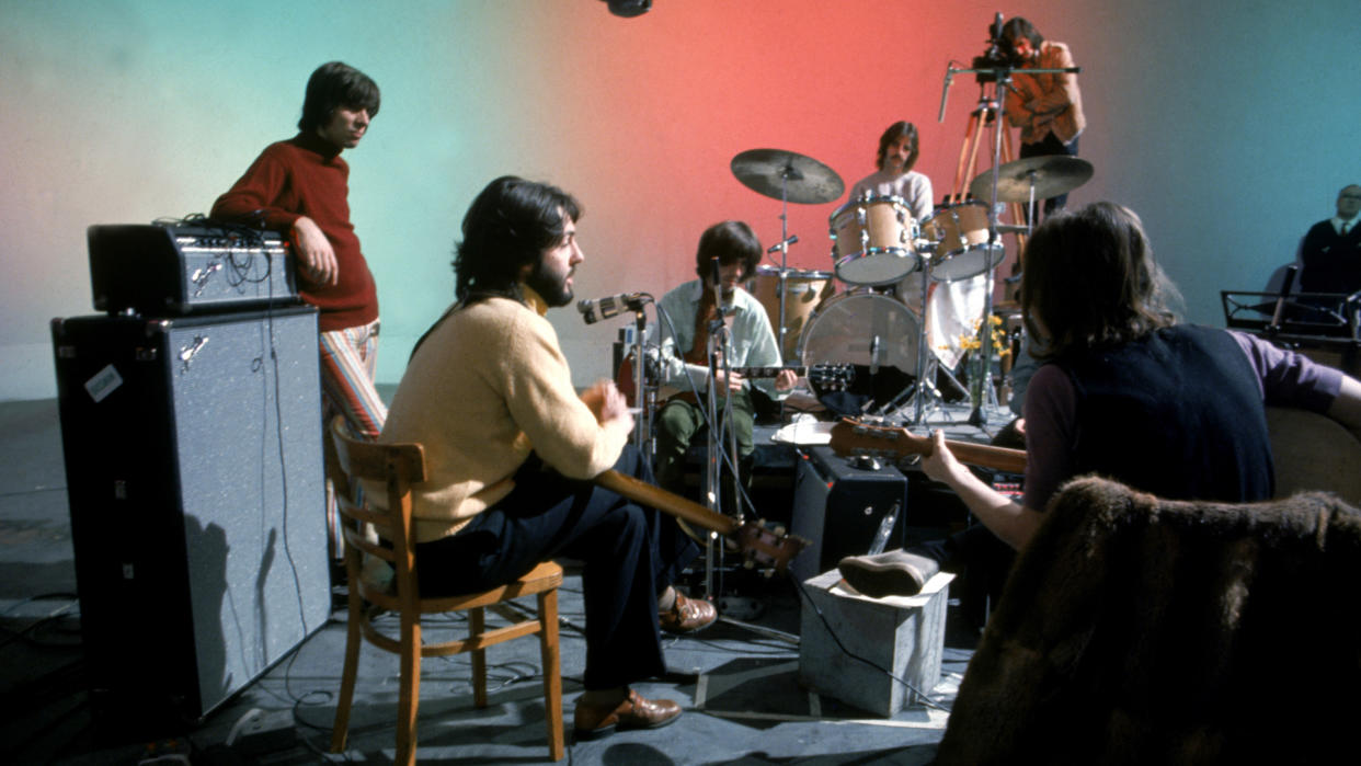  A behind-the-scenes shot of the remastered Let it Be docufilm, one of May's new Disney Plus movies, which shows The Beatles chatting and rehearsing for their final concert in a studio. 