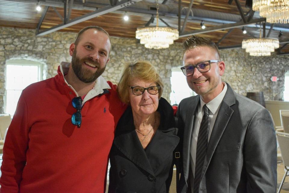 Jamie Knight, left, and Pastor Todd Nielsen, right, hosted the Port Clinton Area Valentine’s Day Widows Luncheon. Here, they stand with guest Linda Reitz of Sandusky.