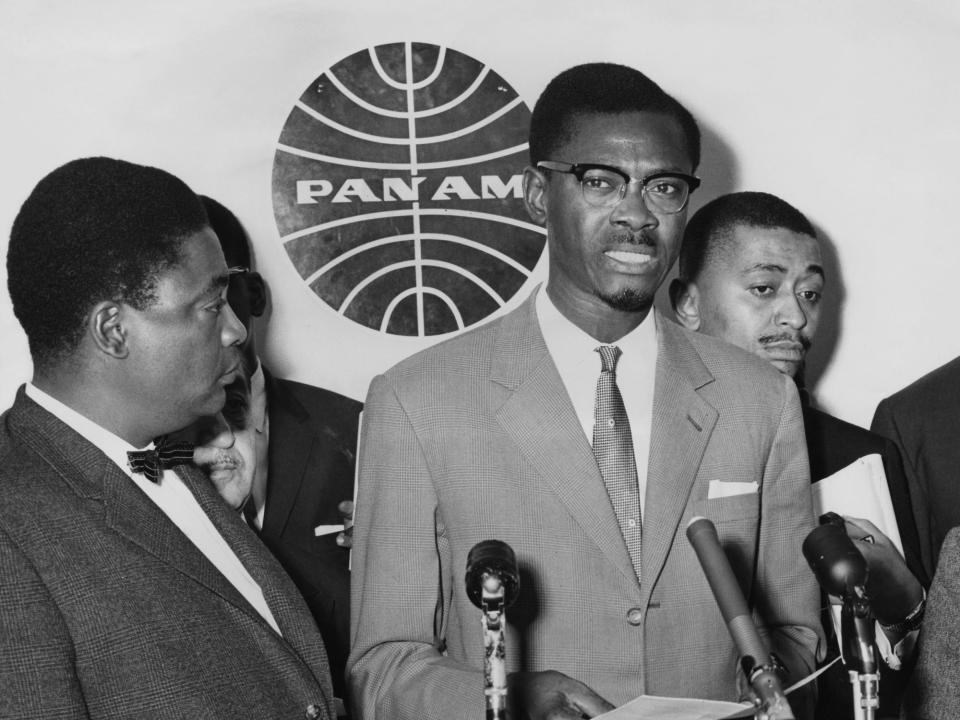 Congolese Prime Minister Patrice Lumumba (1925 - 1961) at John F. Kennedy International Airport, New York, 2nd August 1960. Before leaving for London, Lumumba made a statement that only the immediate withdrawal of Belgian troops from the Congo would avert the crisis there. With Lumumba is Congolese Speaker of the Chamber of Deputies Joseph Kasongo (left).