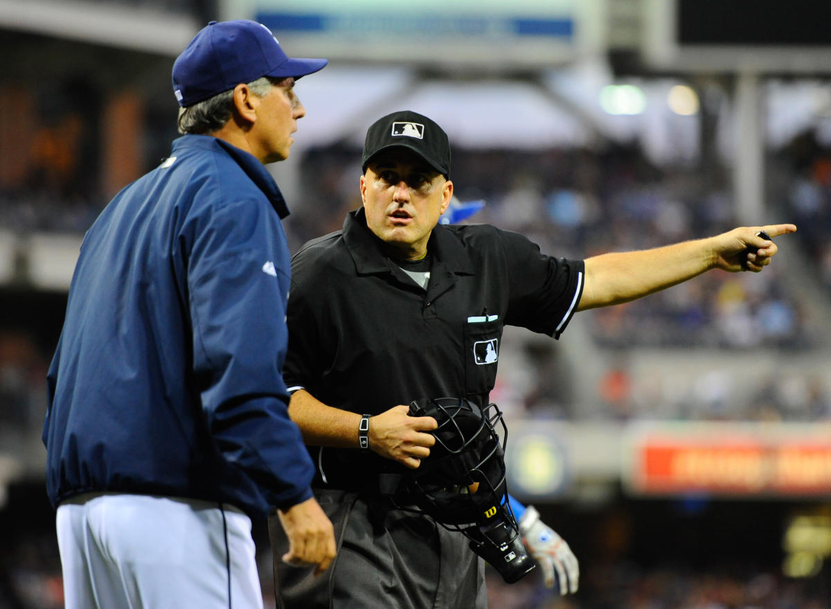 MLB umpire, Iowa native Eric Cooper honored before Game 1 of World Series