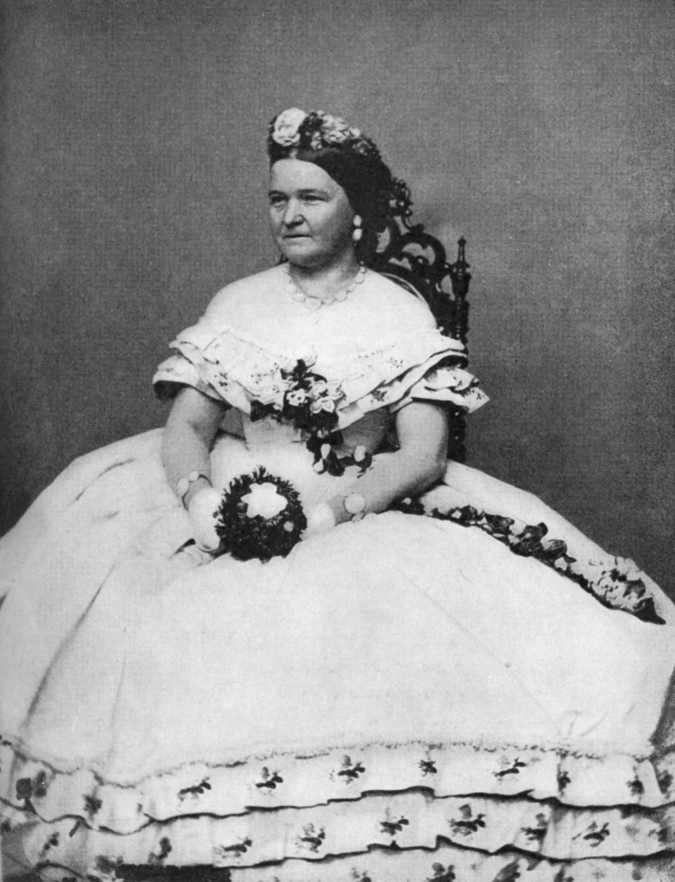 President Abraham Lincoln's wife liked to play around with hair accessories,and sometimes placed a crown of blossoms on her head. A true, original flower child. 