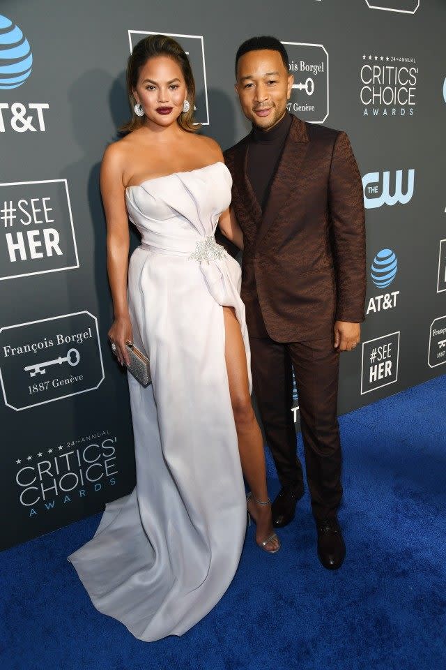 Chrissy Teigen and John Legend attend the 24th annual Critics' Choice Awards at Barker Hangar on January 13, 2019 in Santa Monica, California.
