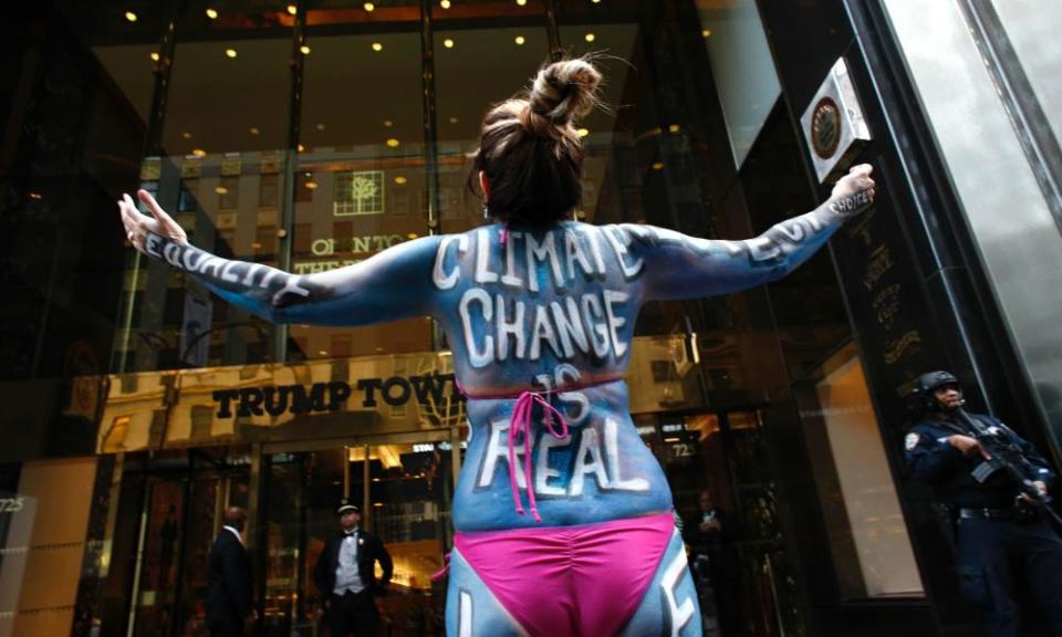 Singer Gigi Love protests outside Trump Tower in New York.