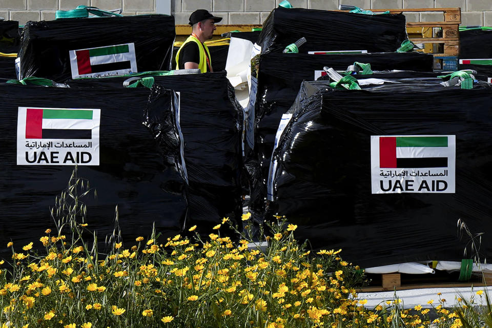Humanitarian aid loaded onto pallets. (Petros Karadjias / AP)