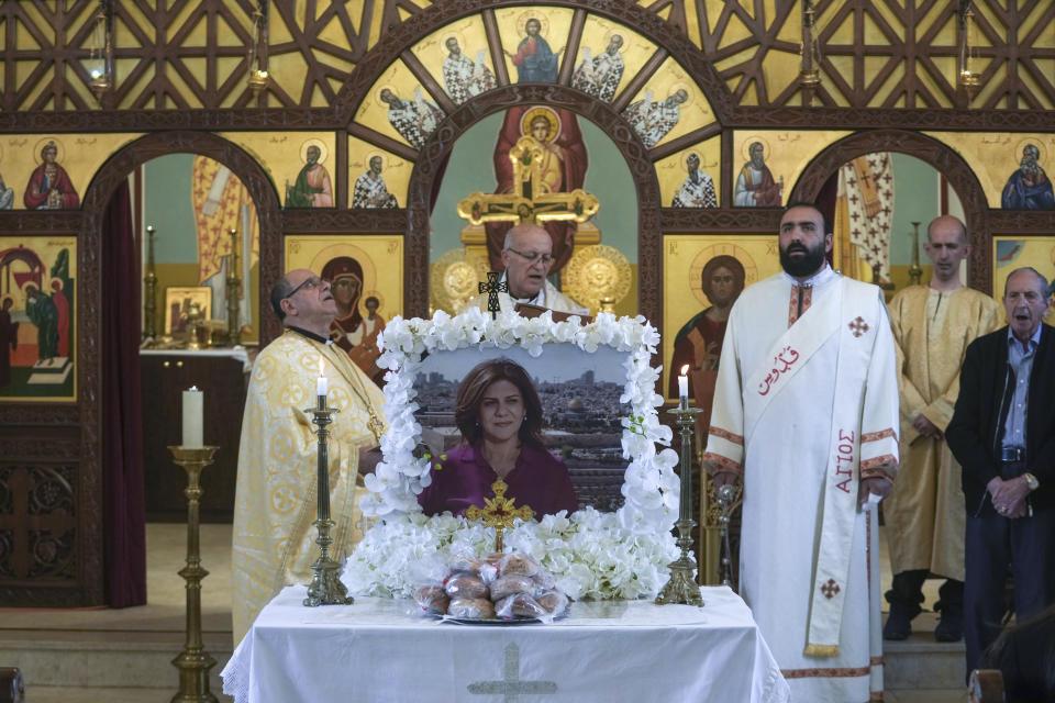 FILE - A memorial mass for slain Al Jazeera correspondent Shireen Abu Akleh is held at a church ahead of the first anniversary of her death, in the east Jerusalem neighborhood of Beit Hanina, Sunday, May 7, 2023. Abu Akleh, a Palestinian-American reporter who covered the Mideast conflict for more than 25 years, was shot dead on May 11, 2022 during an Israeli military raid in the West Bank town of Jenin. (AP Photo/Mahmoud Illean, File)