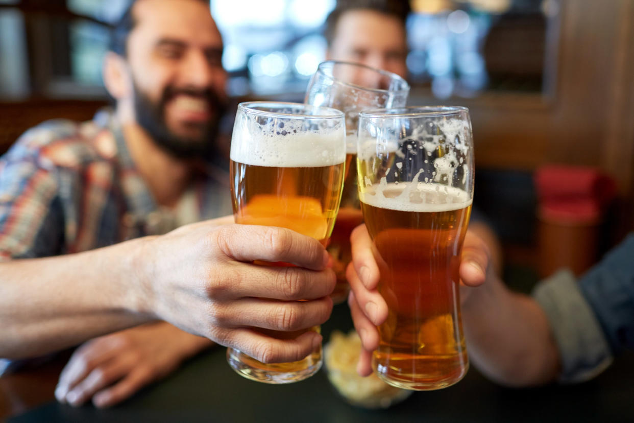 Firm friendships: Men who go for a drink together are more likely to stay friends: Shutterstock