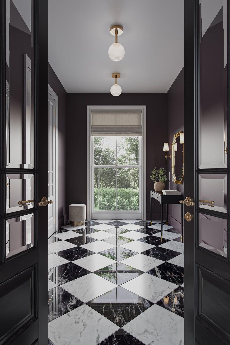 a black and white tiled hallway