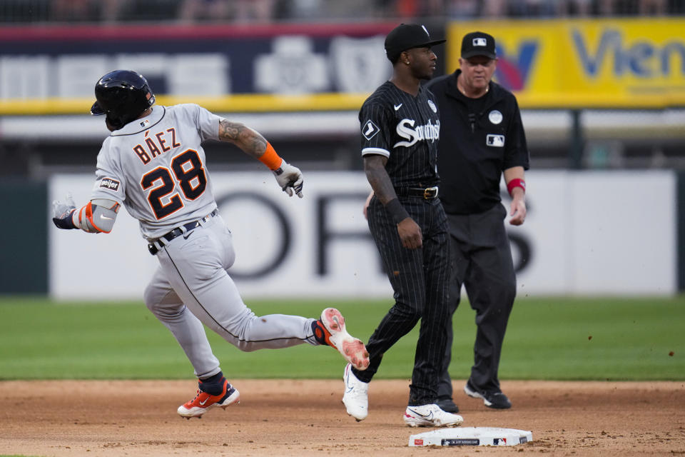 Detroit Tigers' Javier Baez rounds second base on a triple during the fourth inning of the team's baseball game against the Chicago White Sox on Friday, June 2, 2023, in Chicago. (AP Photo/Erin Hooley)